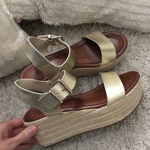 Platform gold sandals!